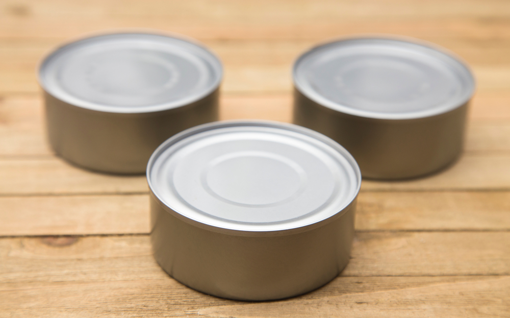 A Silver Tin Containing Food - Tuna, Salmon, or Animal Food