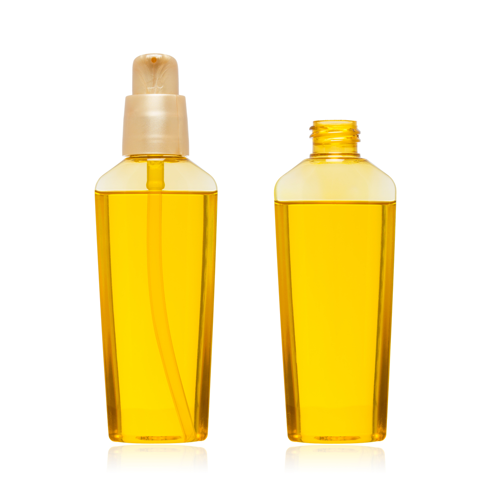 Cosmetic oil bottle isolated on white background