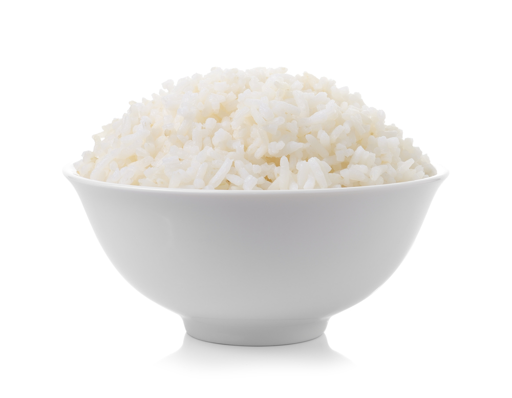 bowl full of rice on white background
