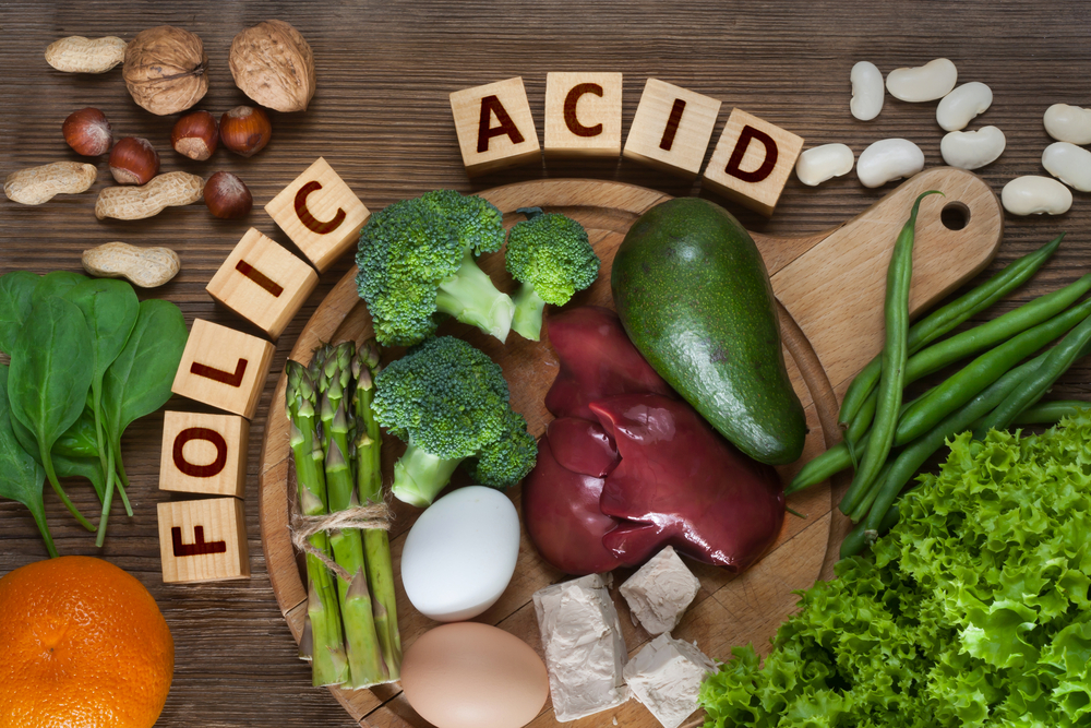 Natural sources of folic acid as liver, asparagus, broccoli, eggs, salad, avocado, yeast, nuts, spinach, orange and beans