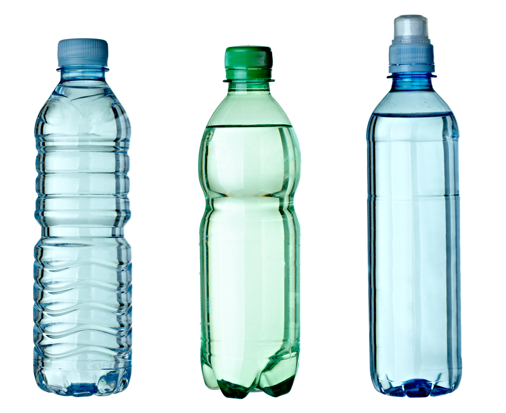 collection of empty used plastic bottles on white background. each one is shot separately